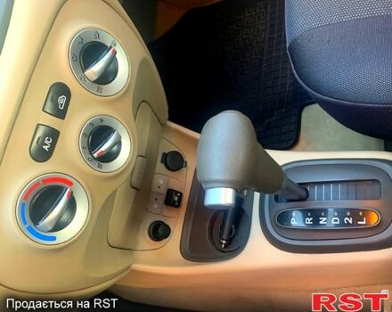 Синий Хендай Акцент, объемом двигателя 1.4 л и пробегом 257 тыс. км за 5400 $, фото 4 на Automoto.ua