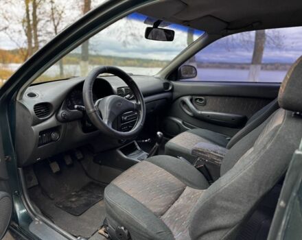 Зеленый Хендай Акцент, объемом двигателя 1.5 л и пробегом 220 тыс. км за 1600 $, фото 12 на Automoto.ua