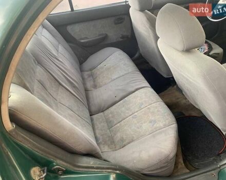 Зелений Хендай Акцент, об'ємом двигуна 1.5 л та пробігом 439 тис. км за 1300 $, фото 10 на Automoto.ua