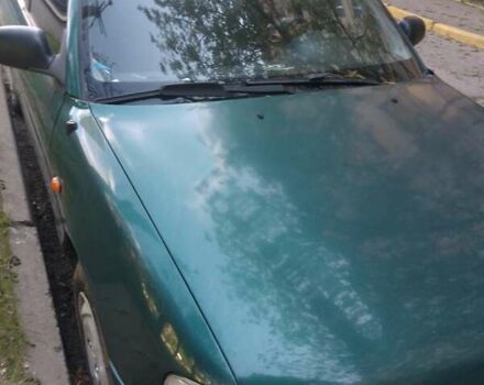 Зелений Хендай Акцент, об'ємом двигуна 1.3 л та пробігом 386 тис. км за 1950 $, фото 4 на Automoto.ua