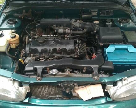 Зелений Хендай Акцент, об'ємом двигуна 1.3 л та пробігом 386 тис. км за 1950 $, фото 7 на Automoto.ua