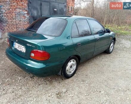 Зеленый Хендай Акцент, объемом двигателя 1.5 л и пробегом 235 тыс. км за 1350 $, фото 7 на Automoto.ua