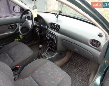 Зеленый Хендай Акцент, объемом двигателя 1.5 л и пробегом 235 тыс. км за 1350 $, фото 9 на Automoto.ua