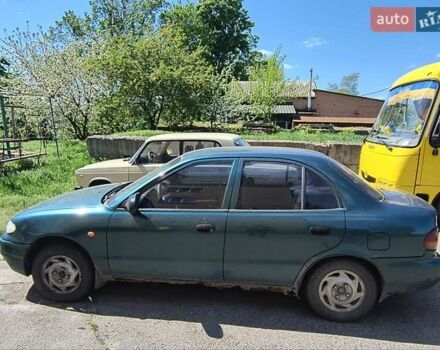 Зелений Хендай Акцент, об'ємом двигуна 1.5 л та пробігом 268 тис. км за 1300 $, фото 6 на Automoto.ua