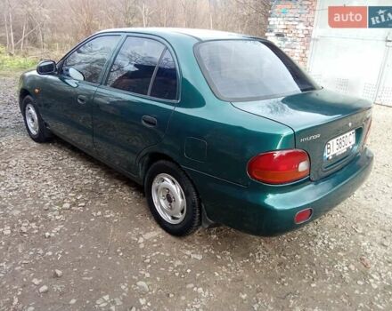 Зеленый Хендай Акцент, объемом двигателя 1.5 л и пробегом 235 тыс. км за 1350 $, фото 5 на Automoto.ua