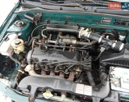 Зеленый Хендай Акцент, объемом двигателя 1.5 л и пробегом 235 тыс. км за 1350 $, фото 14 на Automoto.ua