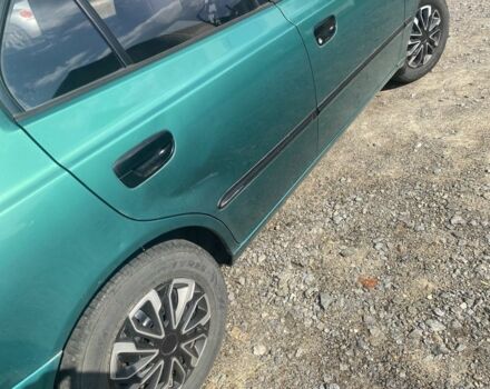 Зеленый Хендай Акцент, объемом двигателя 1.3 л и пробегом 173 тыс. км за 2800 $, фото 5 на Automoto.ua