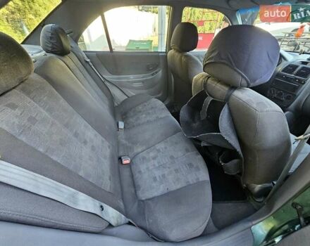 Зелений Хендай Акцент, об'ємом двигуна 1.5 л та пробігом 186 тис. км за 2999 $, фото 5 на Automoto.ua