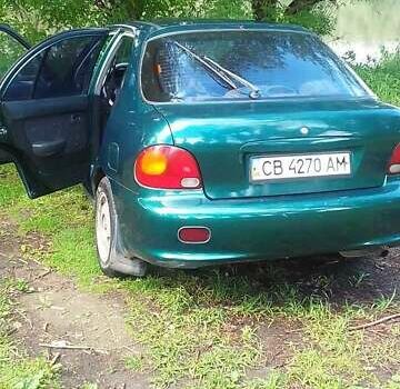 Зеленый Хендай Акцент, объемом двигателя 1.3 л и пробегом 335 тыс. км за 1600 $, фото 5 на Automoto.ua