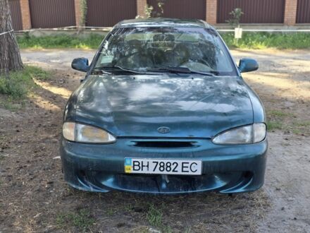 Хендай Акцент 1995 в Василькове на Automoto.ua Зеленый Хендай Акцент, объемом двигателя 1.4 л и пробегом 200 тыс. км за 450 $, фото 1 на Automoto.ua