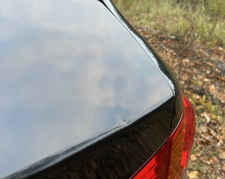 Черный Хендай Аванте, объемом двигателя 1.6 л и пробегом 154 тыс. км за 6000 $, фото 19 на Automoto.ua