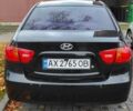 Черный Хендай Аванте, объемом двигателя 1.6 л и пробегом 285 тыс. км за 5857 $, фото 1 на Automoto.ua