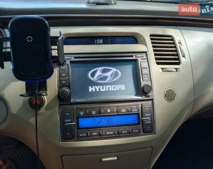 Белый Хендай Азера, объемом двигателя 2.7 л и пробегом 208 тыс. км за 6300 $, фото 13 на Automoto.ua