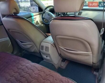 Белый Хендай Азера, объемом двигателя 2.7 л и пробегом 208 тыс. км за 6300 $, фото 6 на Automoto.ua