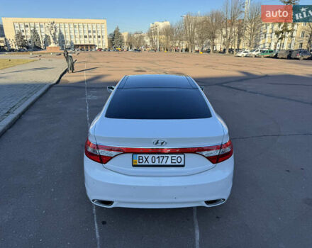 Белый Хендай Азера, объемом двигателя 3 л и пробегом 178 тыс. км за 9899 $, фото 22 на Automoto.ua
