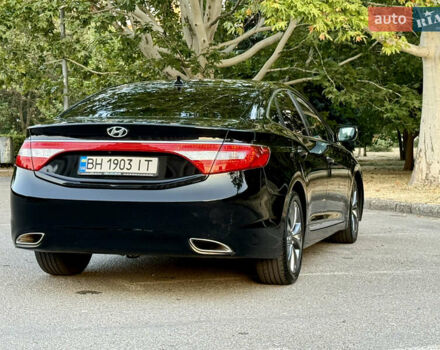 Черный Хендай Азера, объемом двигателя 3.3 л и пробегом 189 тыс. км за 9800 $, фото 7 на Automoto.ua