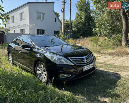 Черный Хендай Азера, объемом двигателя 3 л и пробегом 181 тыс. км за 12200 $, фото 1 на Automoto.ua
