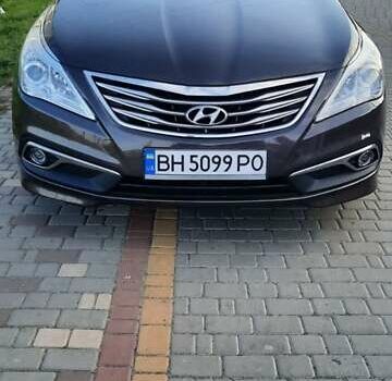 Коричневий Хендай Азера, об'ємом двигуна 3.3 л та пробігом 170 тис. км за 13999 $, фото 1 на Automoto.ua