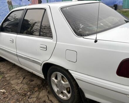 Белый Хендай Купе, объемом двигателя 2 л и пробегом 237 тыс. км за 1000 $, фото 4 на Automoto.ua