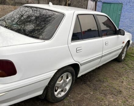 Белый Хендай Купе, объемом двигателя 2 л и пробегом 237 тыс. км за 1000 $, фото 6 на Automoto.ua