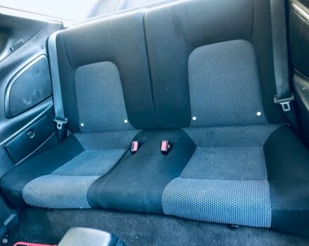 Черный Хендай Купе, объемом двигателя 2 л и пробегом 250 тыс. км за 3788 $, фото 6 на Automoto.ua