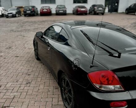 Чорний Хендай Купе, об'ємом двигуна 2 л та пробігом 312 тис. км за 3450 $, фото 4 на Automoto.ua