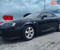 Черный Хендай Купе, объемом двигателя 2 л и пробегом 216 тыс. км за 6800 $, фото 1 на Automoto.ua