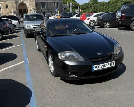 Чорний Хендай Купе, об'ємом двигуна 2 л та пробігом 112 тис. км за 5999 $, фото 1 на Automoto.ua