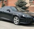 Черный Хендай Купе, объемом двигателя 1.98 л и пробегом 175 тыс. км за 4800 $, фото 1 на Automoto.ua