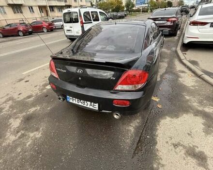 Чорний Хендай Купе, об'ємом двигуна 2 л та пробігом 112 тис. км за 5999 $, фото 7 на Automoto.ua