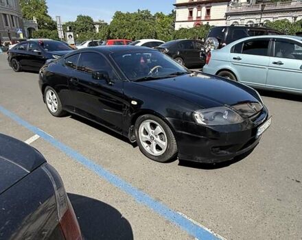 Чорний Хендай Купе, об'ємом двигуна 2 л та пробігом 112 тис. км за 5999 $, фото 2 на Automoto.ua