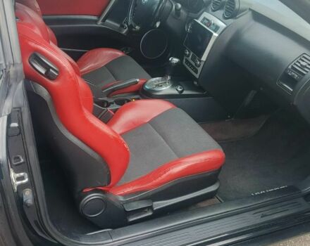 Черный Хендай Купе, объемом двигателя 2 л и пробегом 210 тыс. км за 5800 $, фото 9 на Automoto.ua