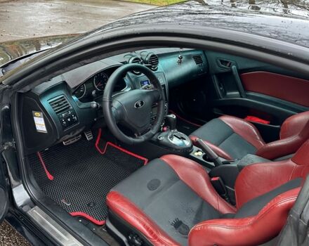 Чорний Хендай Купе, об'ємом двигуна 2 л та пробігом 198 тис. км за 8152 $, фото 7 на Automoto.ua