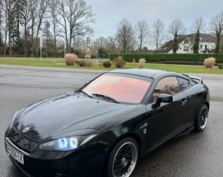 Чорний Хендай Купе, об'ємом двигуна 2 л та пробігом 198 тис. км за 8152 $, фото 2 на Automoto.ua