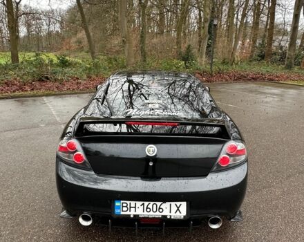 Чорний Хендай Купе, об'ємом двигуна 2 л та пробігом 198 тис. км за 8152 $, фото 5 на Automoto.ua
