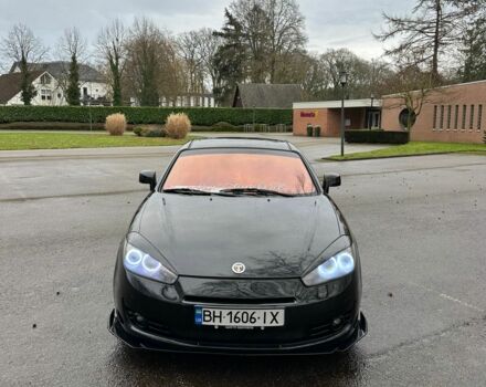 Чорний Хендай Купе, об'ємом двигуна 2 л та пробігом 198 тис. км за 8152 $, фото 1 на Automoto.ua