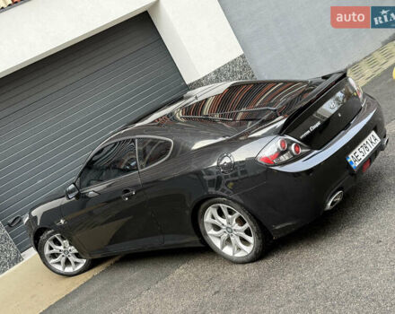 Черный Хендай Купе, объемом двигателя 2.66 л и пробегом 110 тыс. км за 4499 $, фото 7 на Automoto.ua