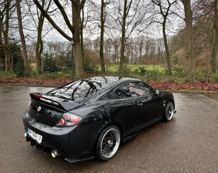 Чорний Хендай Купе, об'ємом двигуна 2 л та пробігом 198 тис. км за 8152 $, фото 4 на Automoto.ua