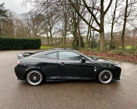 Чорний Хендай Купе, об'ємом двигуна 2 л та пробігом 198 тис. км за 8152 $, фото 3 на Automoto.ua