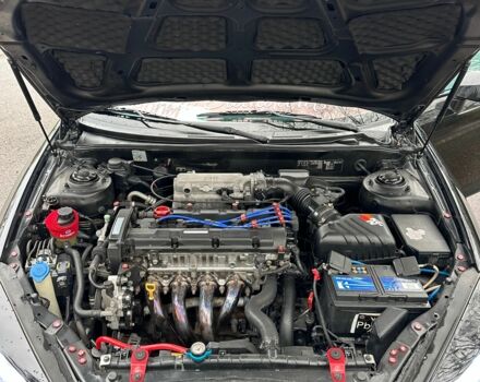 Чорний Хендай Купе, об'ємом двигуна 2 л та пробігом 198 тис. км за 8152 $, фото 11 на Automoto.ua