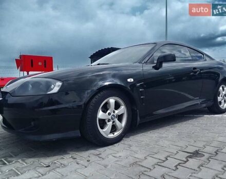 Черный Хендай Купе, объемом двигателя 2 л и пробегом 216 тыс. км за 6500 $, фото 1 на Automoto.ua