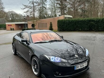 Чорний Хендай Купе, об'ємом двигуна 2 л та пробігом 198 тис. км за 8152 $, фото 1 на Automoto.ua