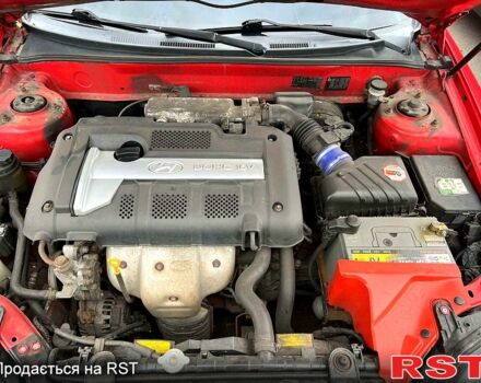 Красный Хендай Купе, объемом двигателя 2 л и пробегом 245 тыс. км за 6550 $, фото 7 на Automoto.ua