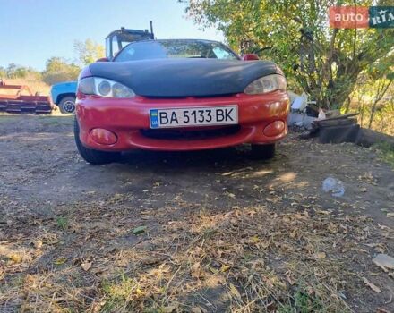 Красный Хендай Купе, объемом двигателя 2 л и пробегом 266 тыс. км за 2600 $, фото 4 на Automoto.ua