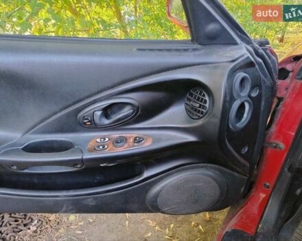 Красный Хендай Купе, объемом двигателя 2 л и пробегом 266 тыс. км за 2600 $, фото 6 на Automoto.ua