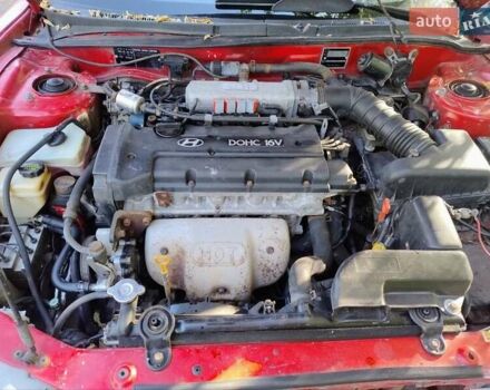 Красный Хендай Купе, объемом двигателя 2 л и пробегом 266 тыс. км за 2600 $, фото 16 на Automoto.ua