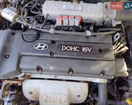 Красный Хендай Купе, объемом двигателя 2 л и пробегом 266 тыс. км за 2600 $, фото 13 на Automoto.ua