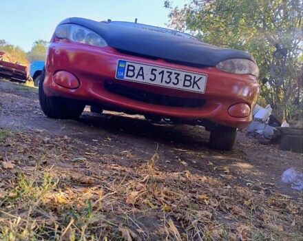 Красный Хендай Купе, объемом двигателя 2 л и пробегом 266 тыс. км за 2600 $, фото 3 на Automoto.ua