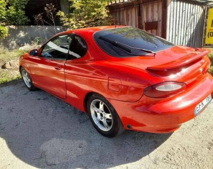 Красный Хендай Купе, объемом двигателя 2 л и пробегом 258 тыс. км за 1700 $, фото 2 на Automoto.ua