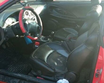 Красный Хендай Купе, объемом двигателя 2 л и пробегом 236 тыс. км за 4000 $, фото 5 на Automoto.ua